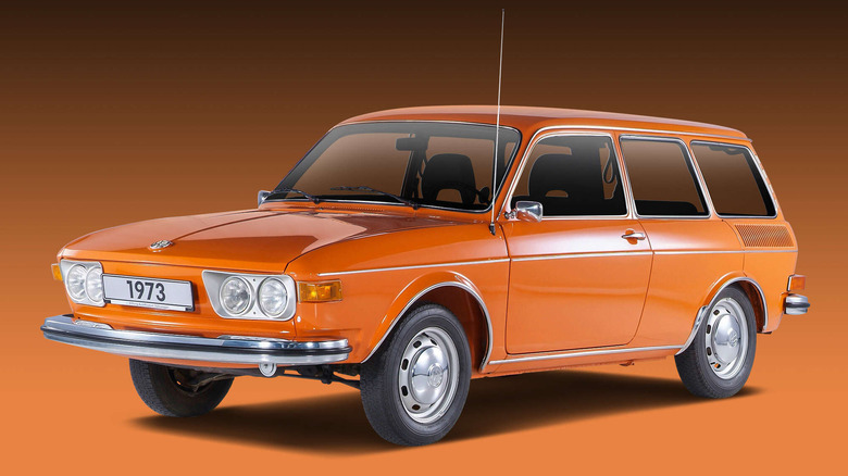 Front 3/4 view of orange VW 412 0n orange background
