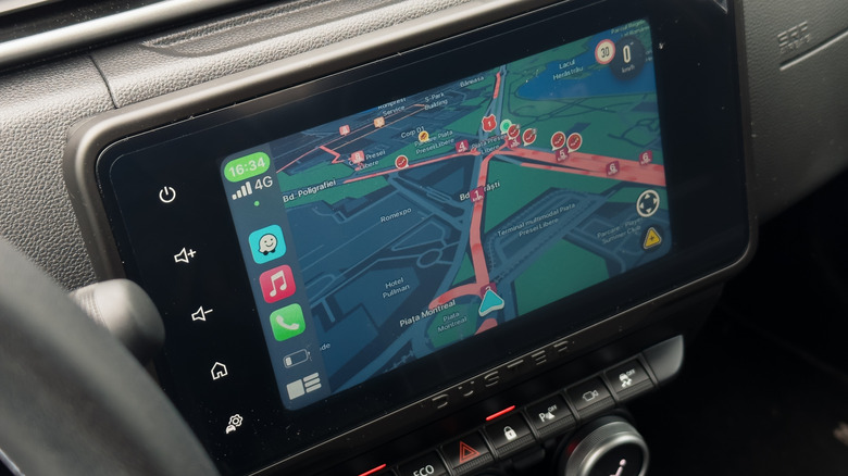 Waze navigation app running inside a car's infotainment system with CarPlay