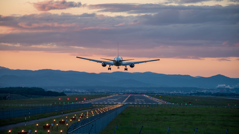 airplane landing on runway