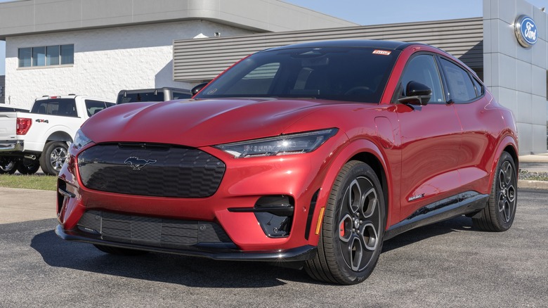 A red 2023 Ford Mustang Mach-E GT parked