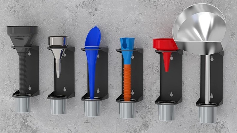 Row of wall-mounted funnel holders