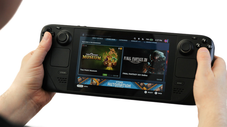 person playing steam deck white background