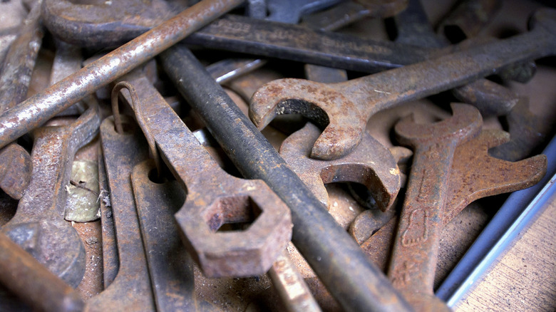Pile of rusty wrenches