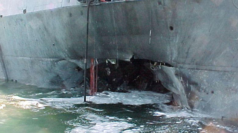 A portside view of the damage cause in the attack on the USS Cole in 2000.