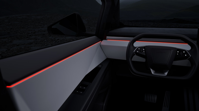 Tesla Cybertruck steering wheel and left door panel with ambient lighting