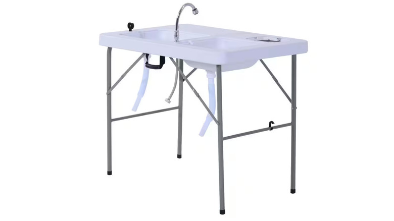 Camping table with dual sinks