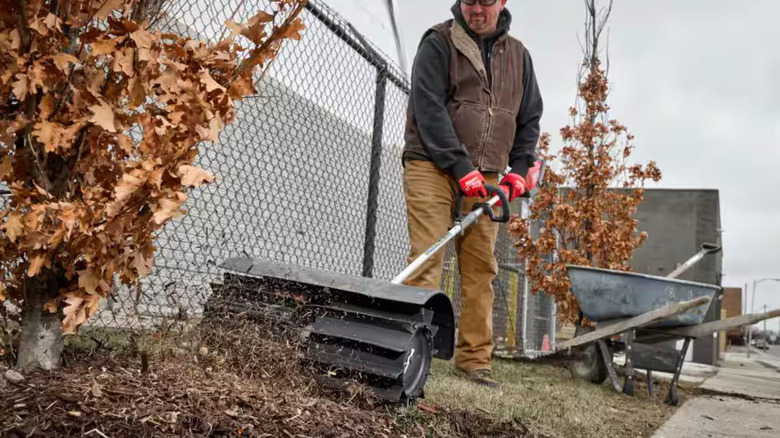 Rubber broom moving debris