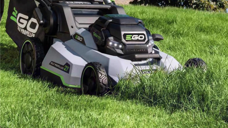 Ego battery powered mower cutting grass