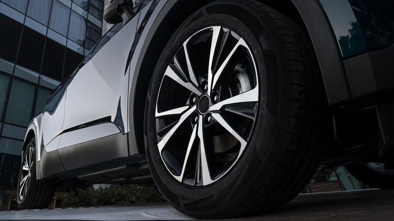 closeup of car tire in dealership showroom