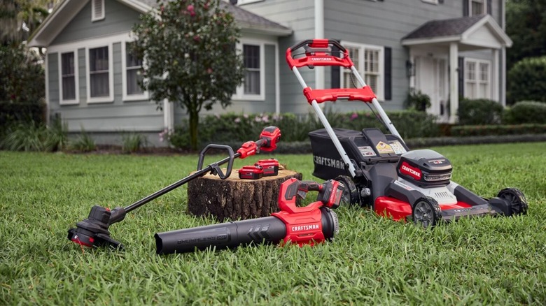 Craftsman V20 lawn equipment in front of a house