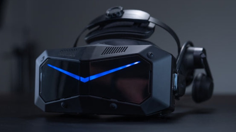 A Pimax Crystal Super VR headset on a table