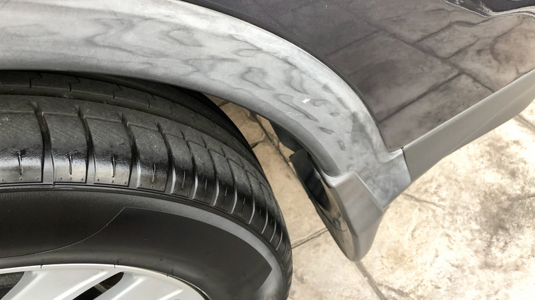 Faded car trim and bumper