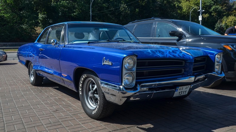 Blue Pontiac Catalina parked in a parking lot
