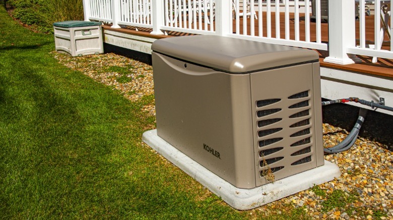 a standby generator by the porch