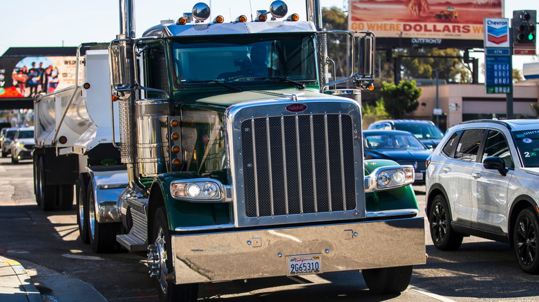 Peterbilt Model 389 semi truck in traffic