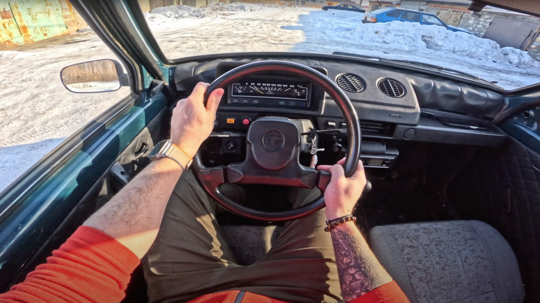 The interior of the Lada Oka, driver's side, two-spoke steering wheel