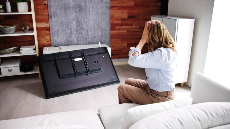 A TV lying on the floor