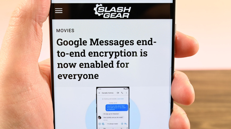 a phone showing a news article about encryption
