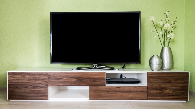 A 55-inch TV in a living room.