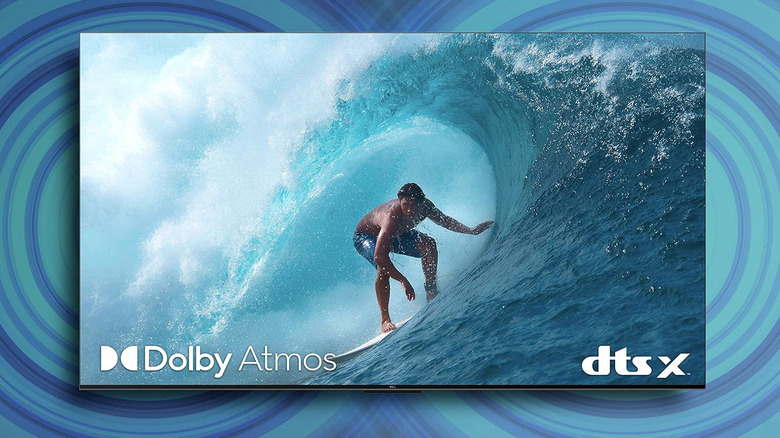 A surfer risding a wave on the TCL Q750G display.