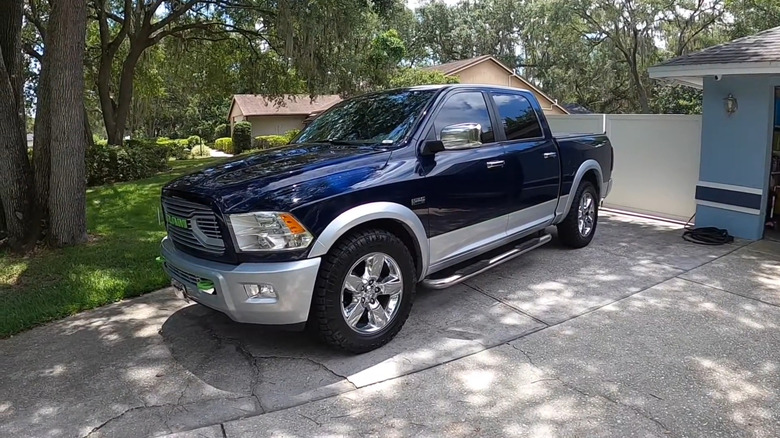 A side on shot of a blue 2012 Ram 1500