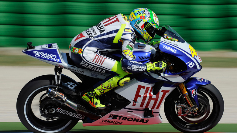 A shot Valentino Rossi riding the 2010 Yamaha YZR-M1
