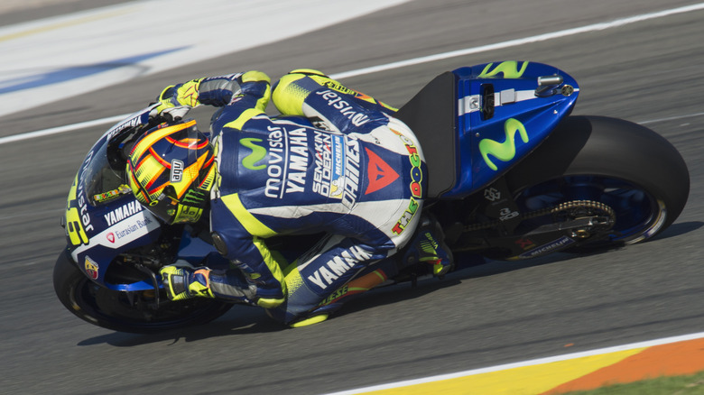 A shot Valentino Rossi riding the 2015 Yamaha YZR-M1