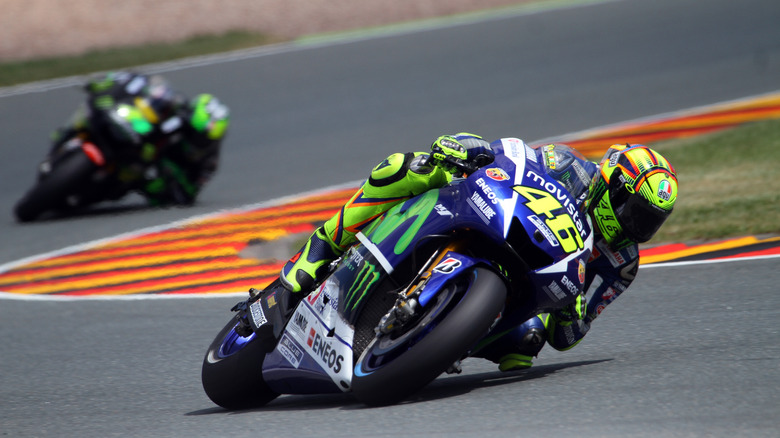 A shot Valentino Rossi riding the 2015 Yamaha YZR-M1