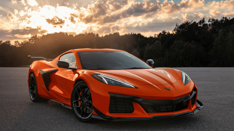 Front-quarter shot of the 2023 Corvette Z06 in orange at sunset