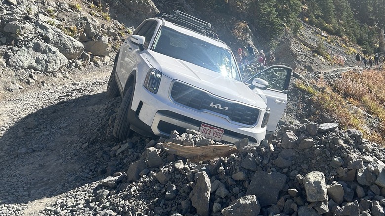 White Kia Telluride stuck on Black Bear Pass in Colorado