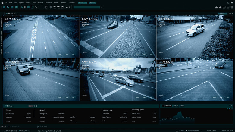 Speed cameras monitoring vehicles on computer