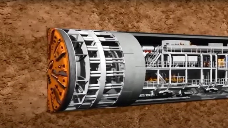 3D rendered cross section of "Mary" tunnel-boring machine, cutting wheel in front, excavation chamber behind