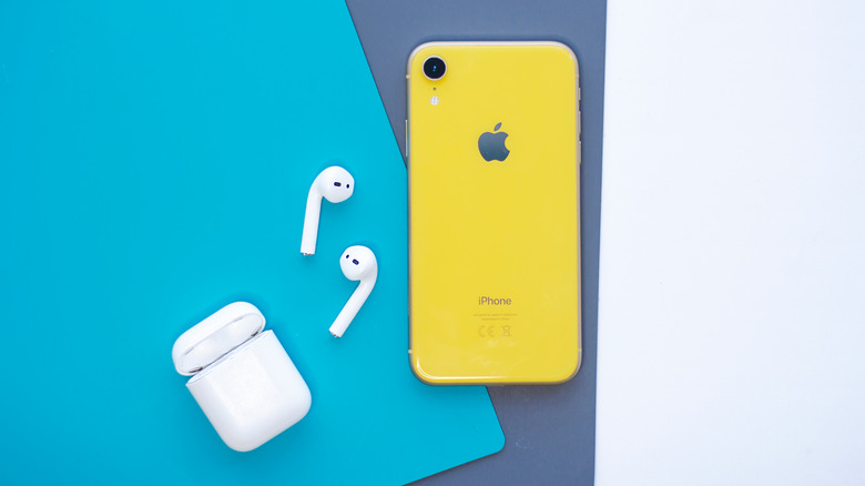 An old iPhone in yellow color option.