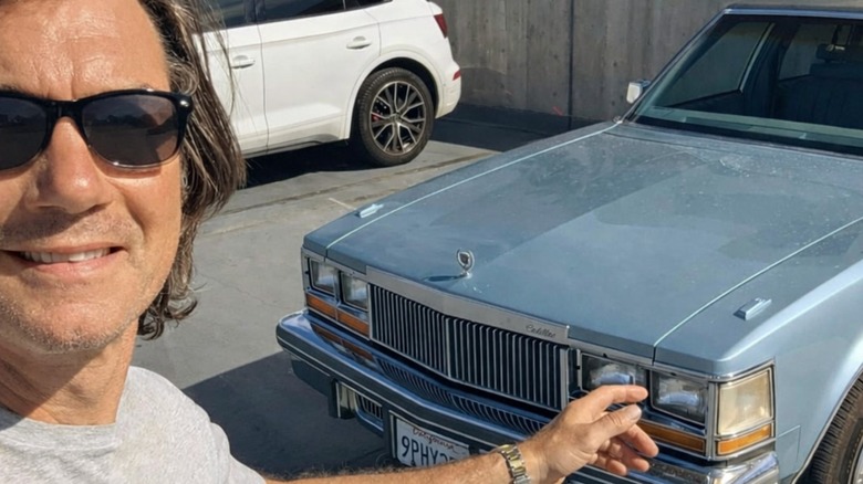 Jerry O'Connell taking a selfie with his '79 Cadillac