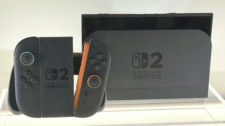 Switch 2 console in its dock, with a Joy-Con 2 controller.