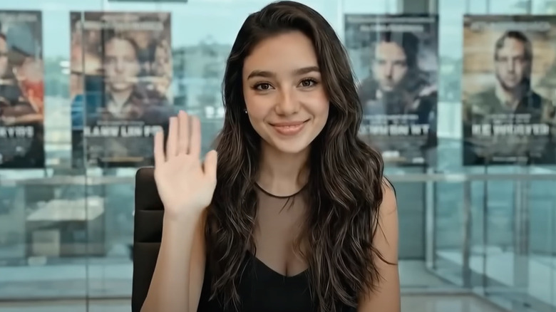 AI actor Tilly Norwood waving to the camera