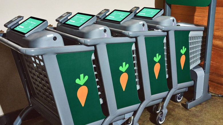 Caper AI shopping carts parked in a supermarket