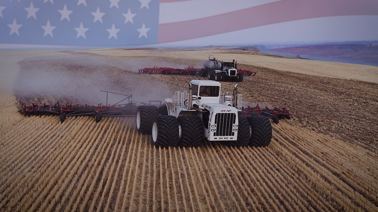 White Big Bud tractor in operation on field