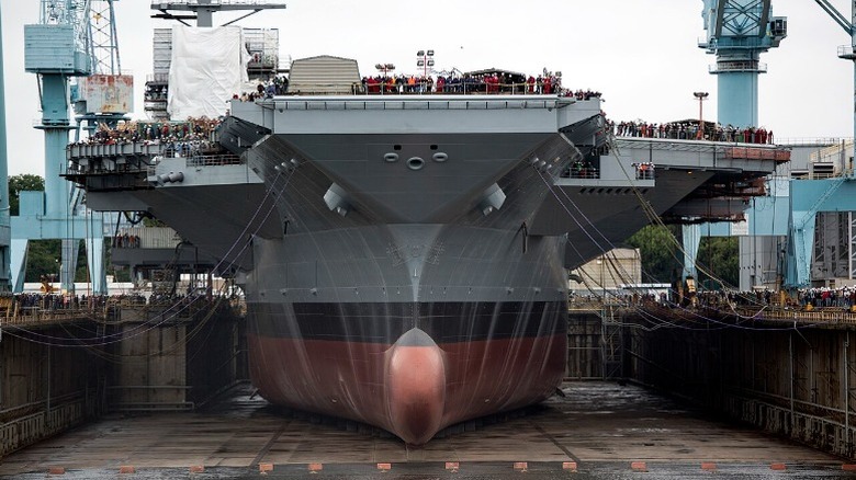 Front view of the USS Gerald R. Ford in a dry dock