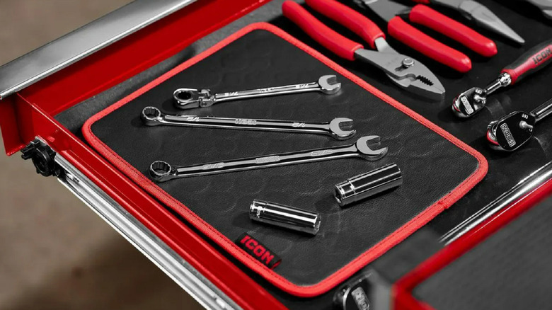 A Harbor Freight ICON Magnetic Tool Mat with wrench on top