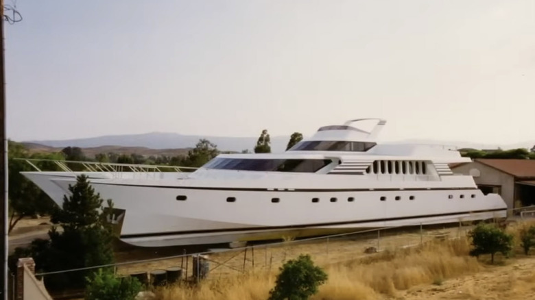 Completed home made yacht in backyard