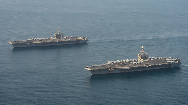 The USS Dwight D. Eisenhower (left) and USS Harry S. Truman in the Arabian Sea