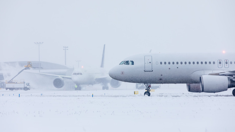 Jets on a snow-covered, icy runway