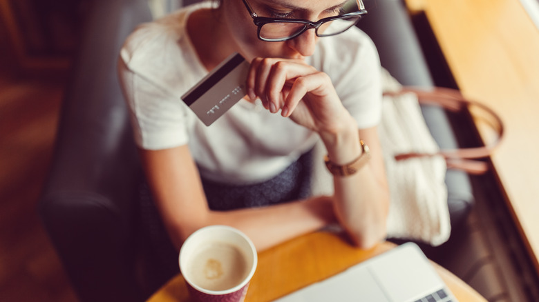woman deciding to buy something