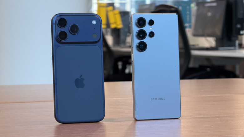 iPhone 17 Pro Max and Samsung Galaxy S25 Ultra on a table