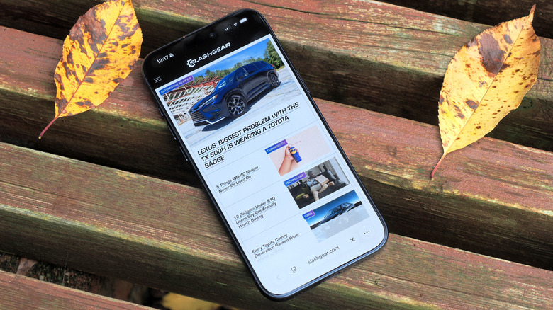 Apple iPhone 17 Pro laying on bench, showing MMtech Online in browser
