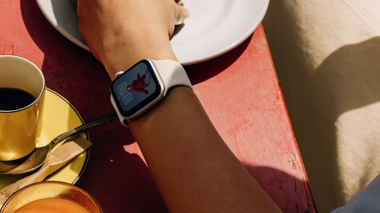 Apple Watch SE 3 on wrist in shade