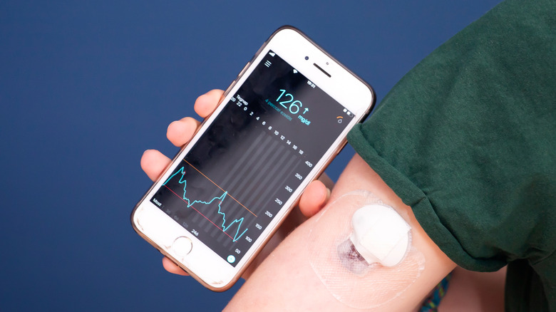 girl glucose monitor