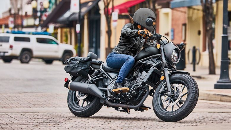 Honda Rebel 300 being ridden on city streets