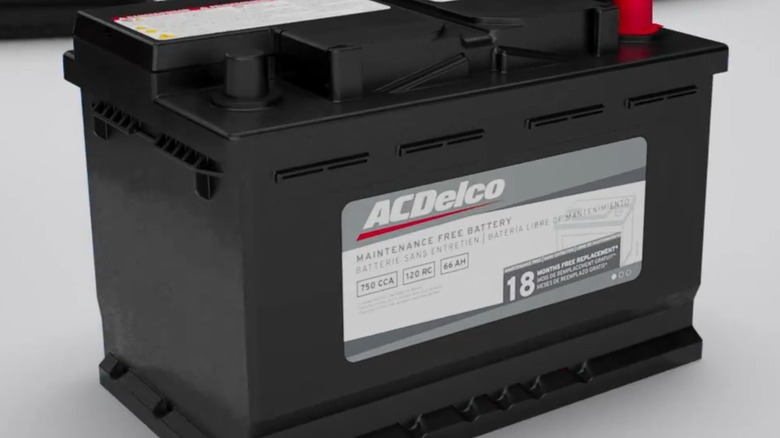 An ACDelco car battery on a table.